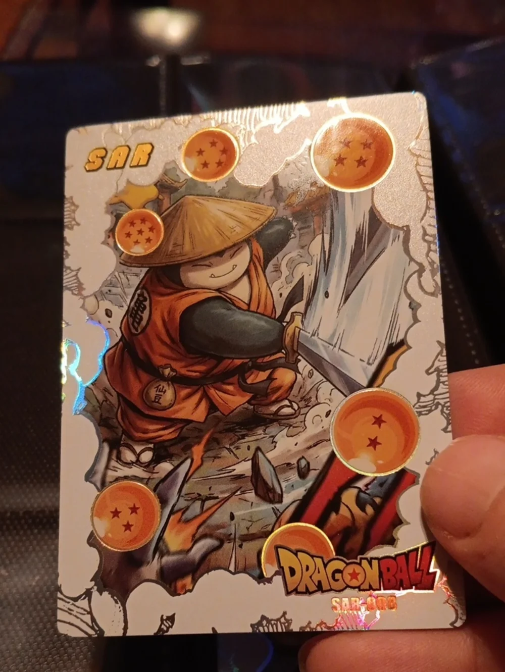 Pokemon trading card orange, gold, black, white